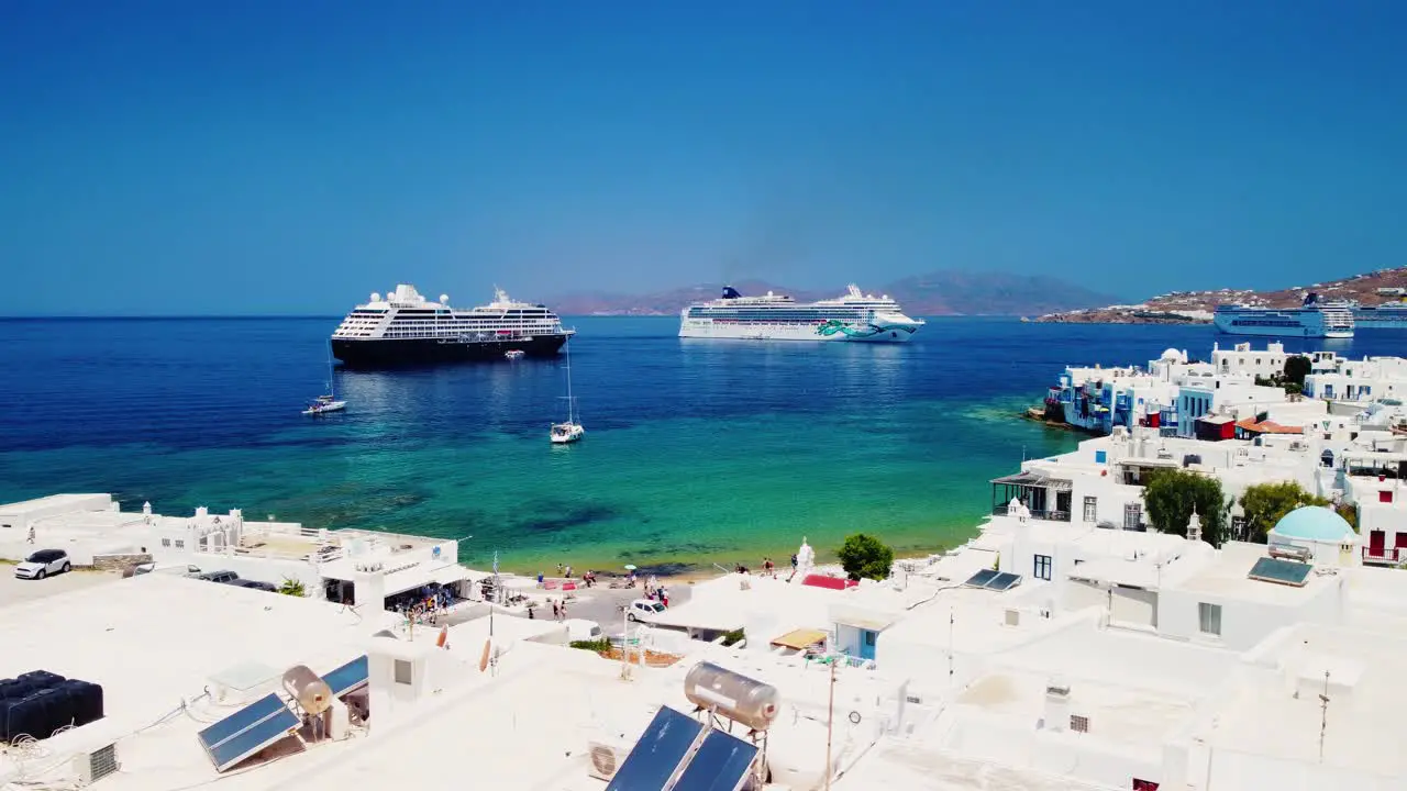 Aerial View Of Old Town in Mykonos Greece during summer Residence Hotel Yacht Boats Sea Vacations Trip Ship cruise