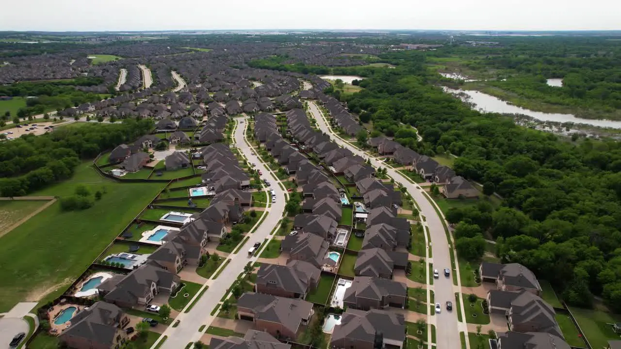 Aerial footage of various houses in neighborhood in the city of Trophy Club in Texas