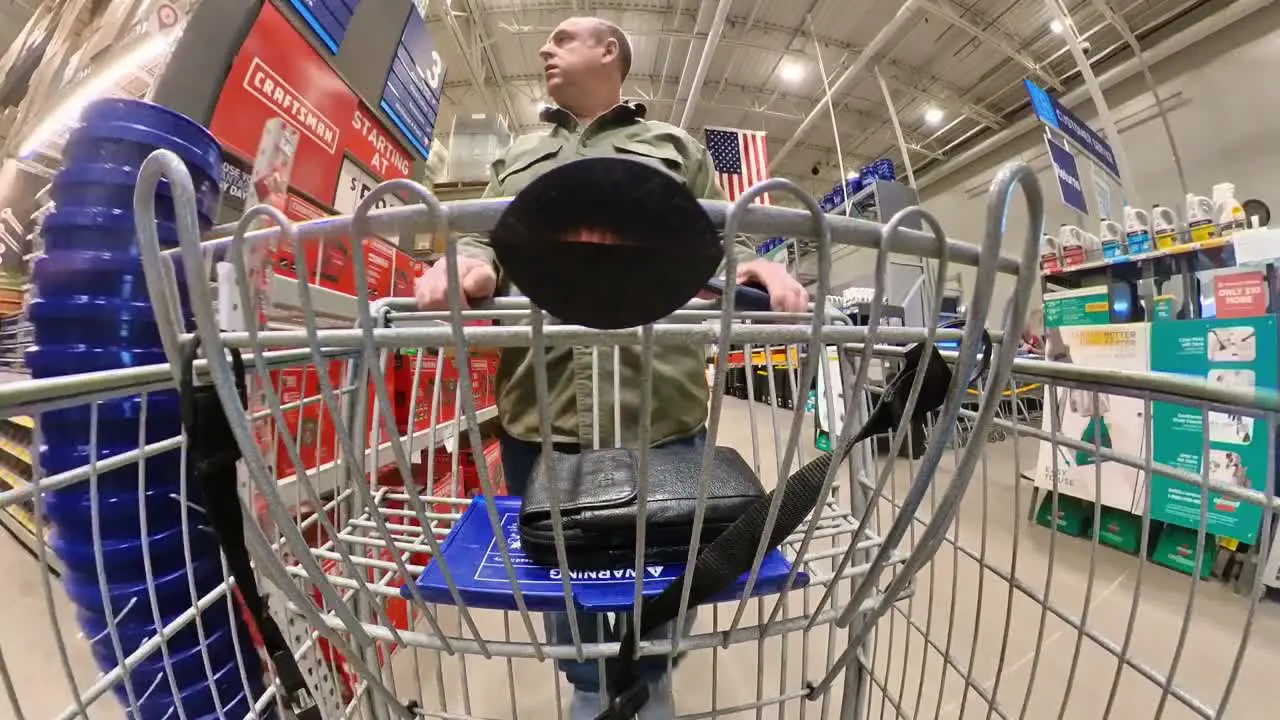 A shopper walks through lowes home improvement in March 2022