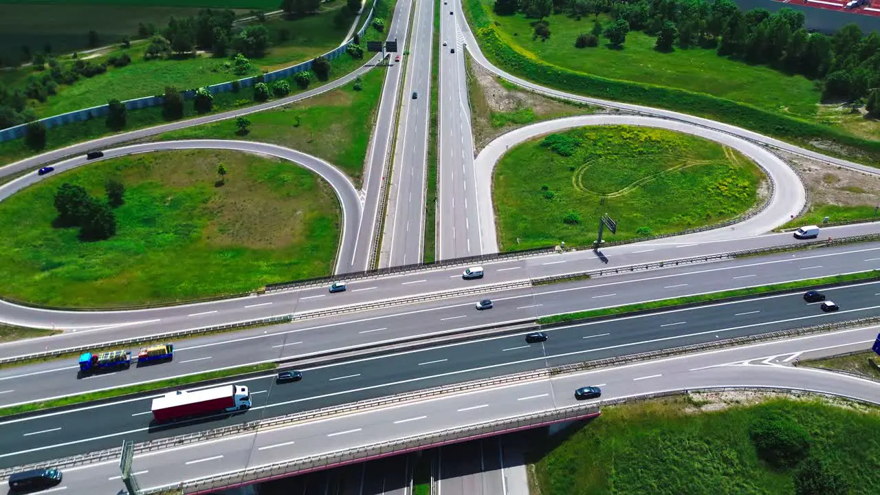 aerial view of highway system transportation infastructure 4k