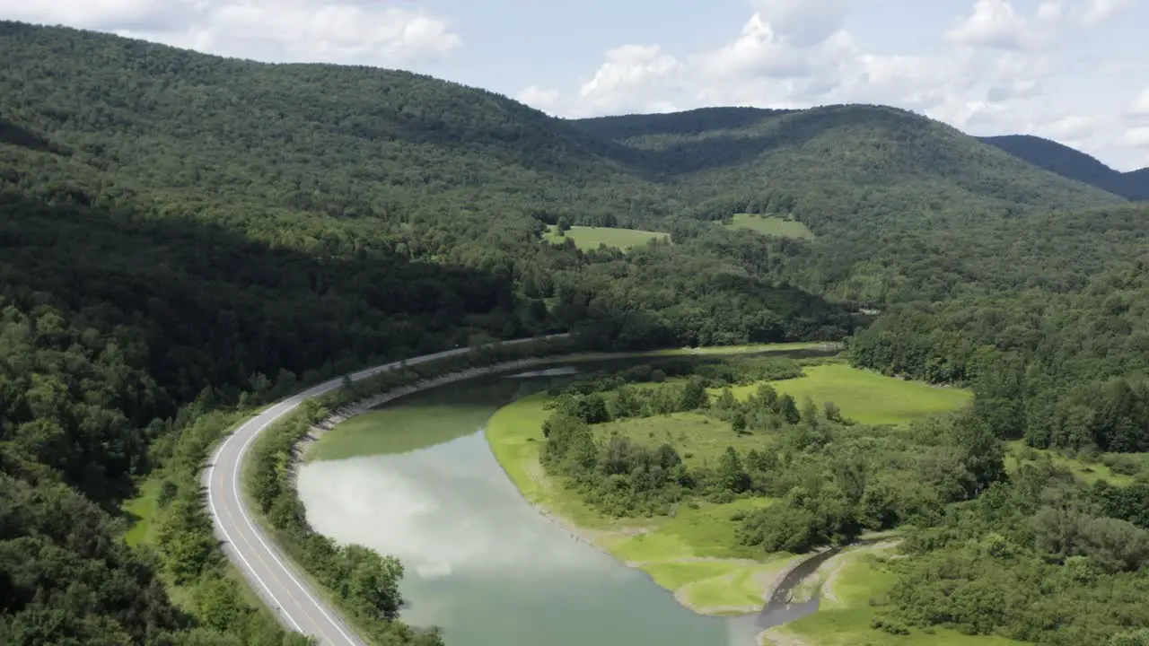 Drone 4K video flying northeast over the west branch of Delaware rive upstream of the Cannonsville Reservoir in the Catskill mountains