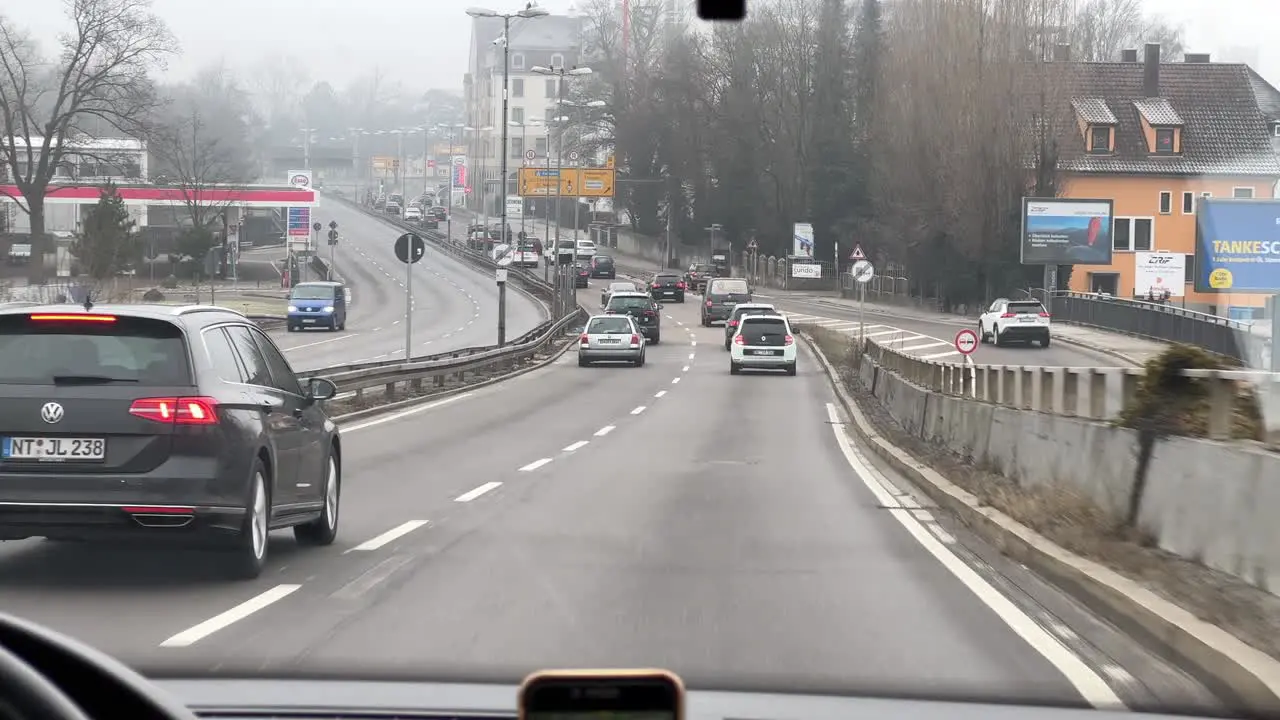 POV wide shot of driving on the B10 through the city of Ulm