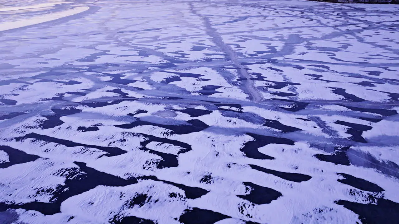 A drone's viewpoint exploring the intricate world of gigantic ice floes on the water