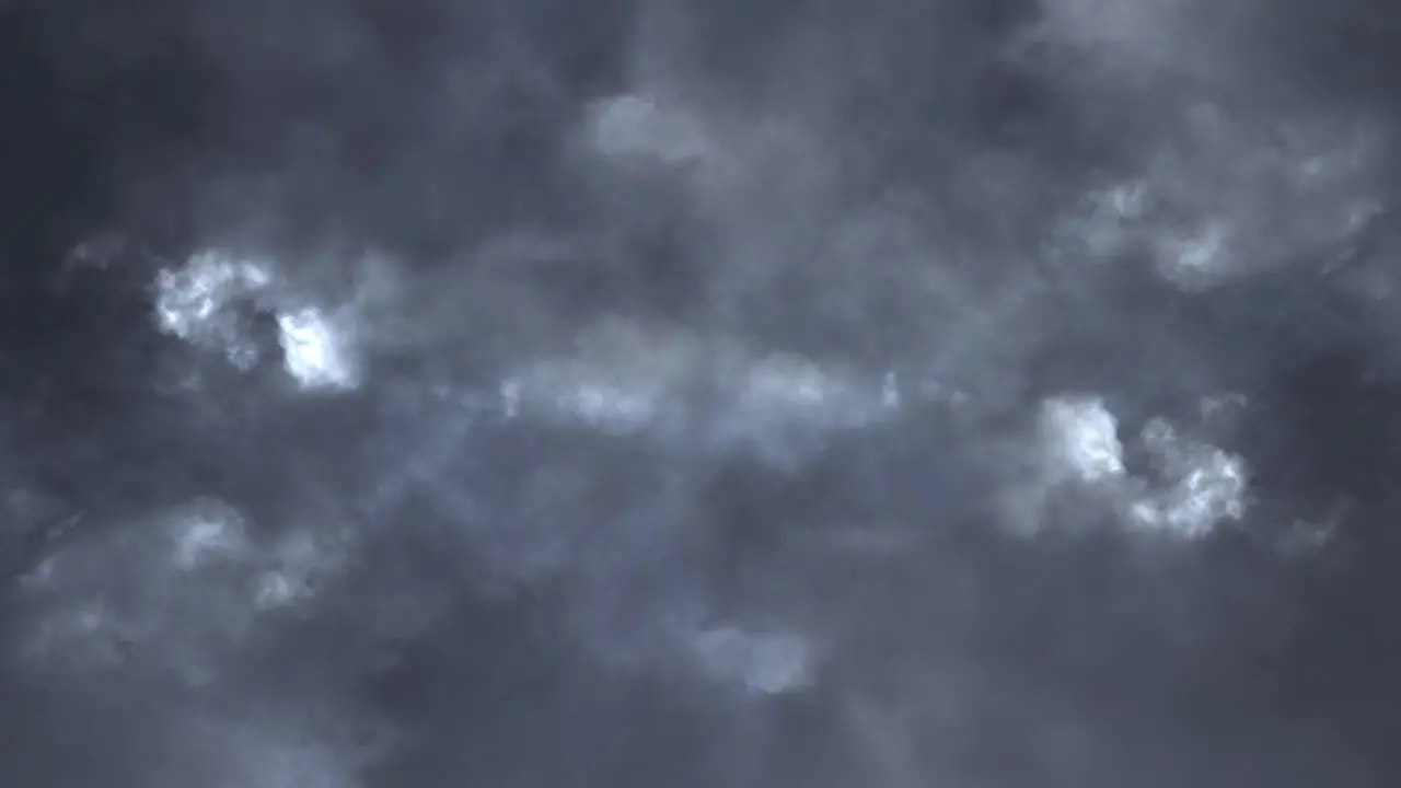 big Thunderstorm Clouds At Night With Lightning