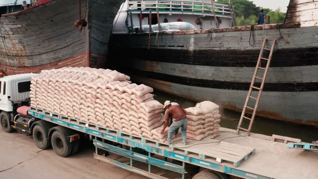 Tracking Shot of Men Working in Jakarta