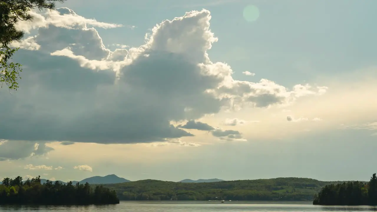 Storm clouds moving and building over beautiful rural lake time lapse HD 30fps