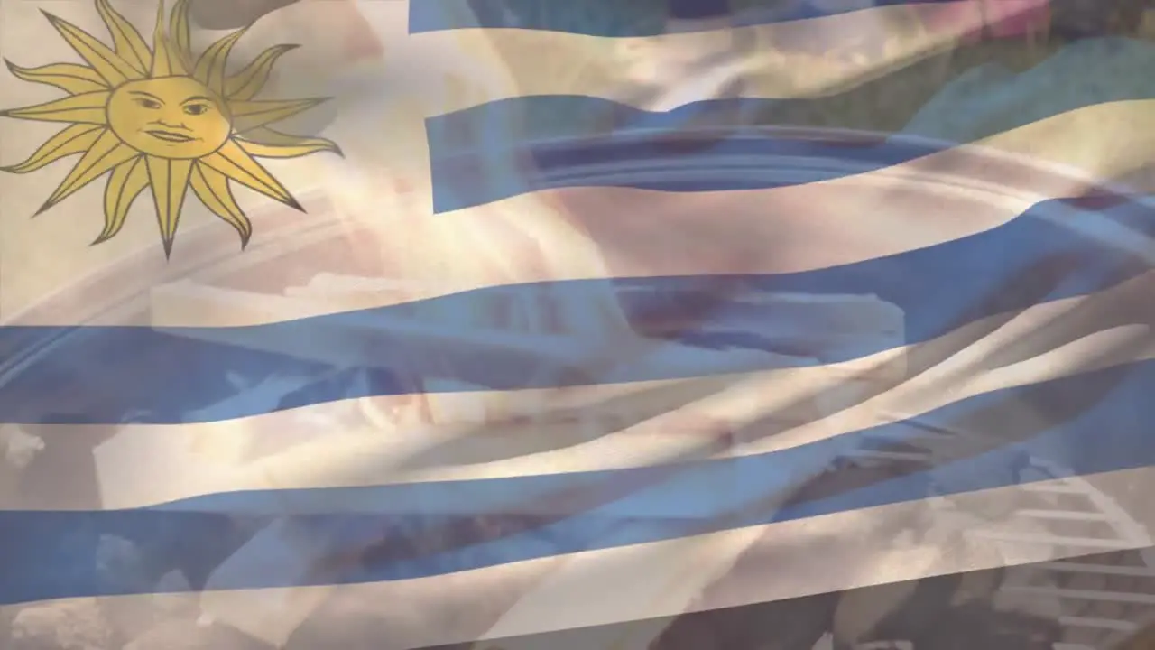 Animation of uruguay flag waving over firewood burning on barbecue grill