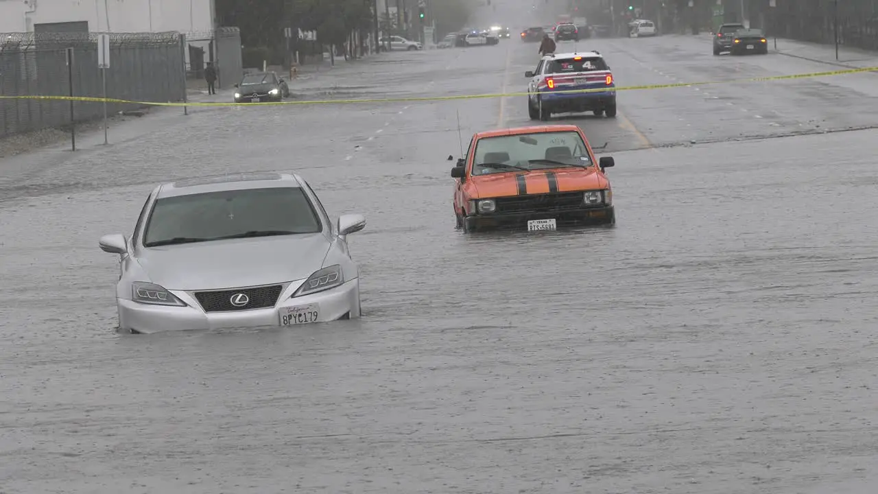 cars in deep floodwaters hd