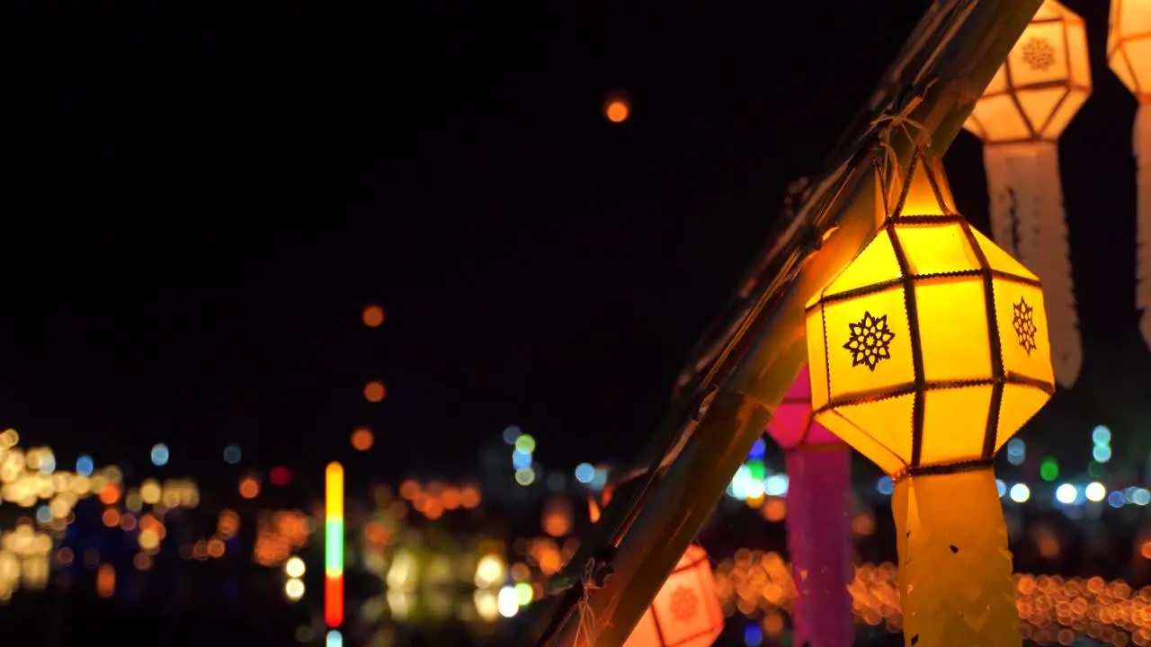 Stunning scenery at Yi Peng Loy Krathong festival in Thailand with lanterns at night