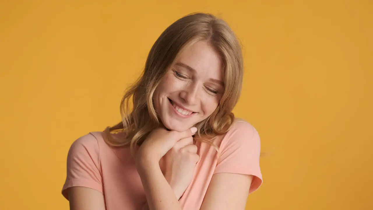 Caucasian woman looking sweet on camera