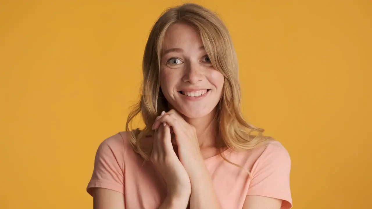 Caucasian woman looking surprised on camera