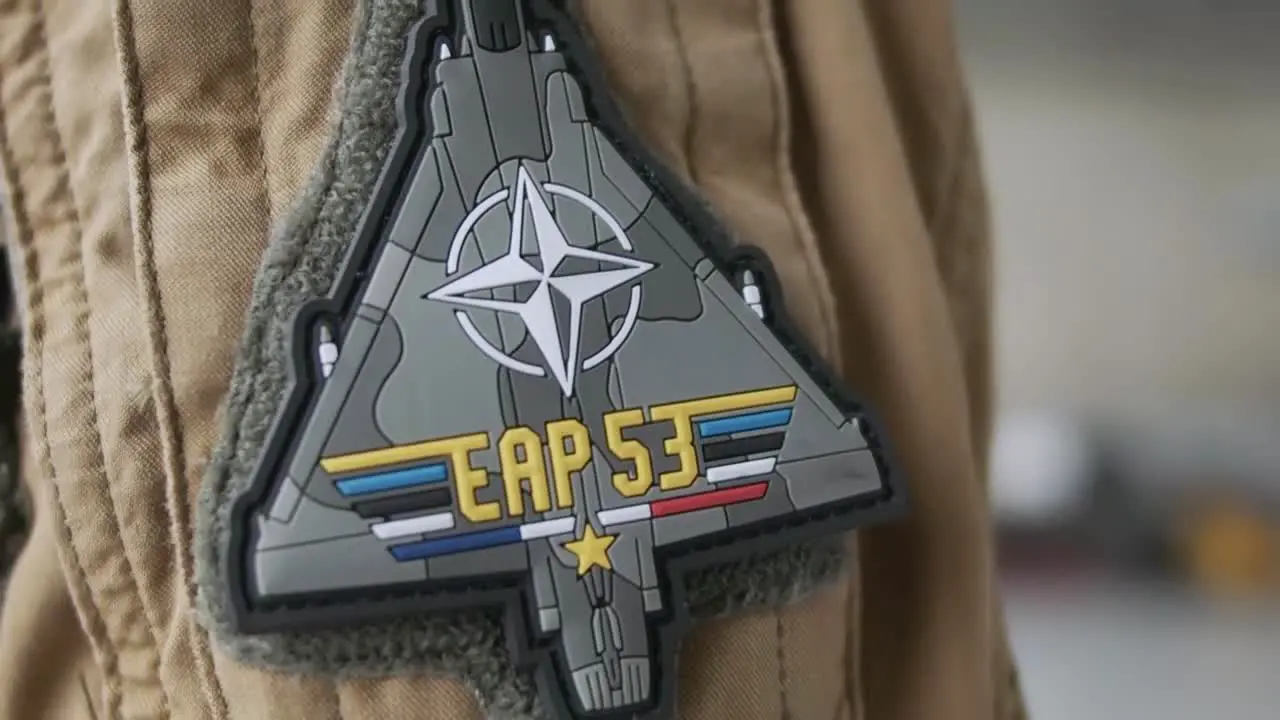 Close Up Shots Of A French Air Force Fighter Pilot His Helmet And Uniform Patches