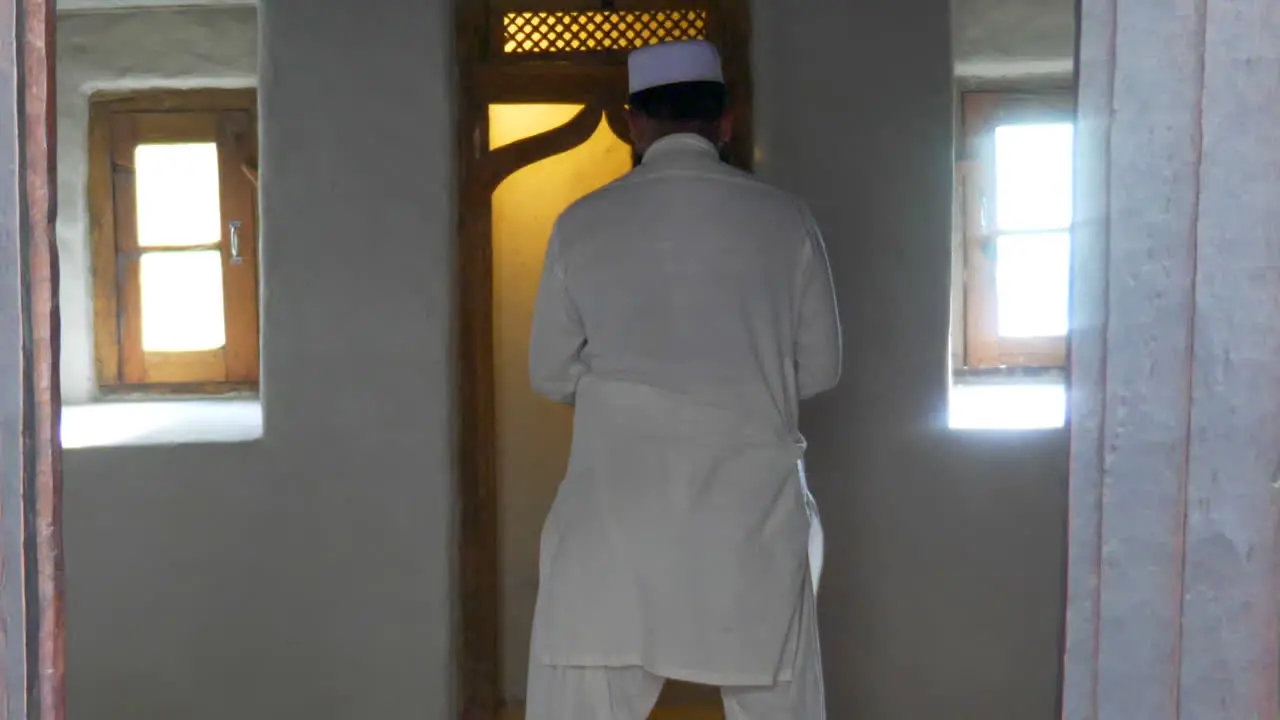 Muslim priest praying