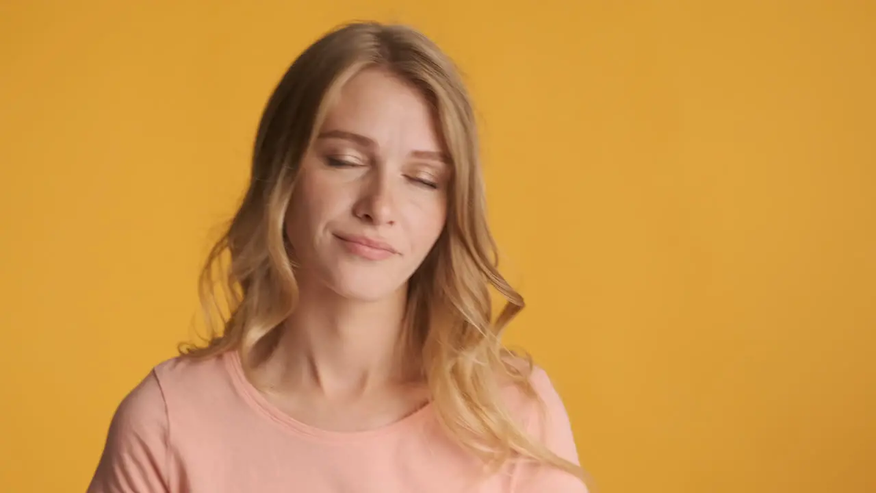 Caucasian woman looking bored on camera