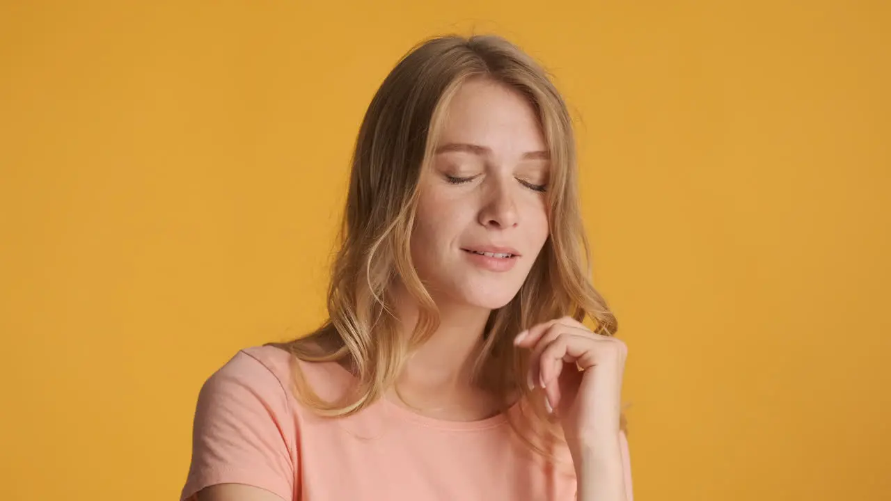 Caucasian woman thinking and nodding on camera