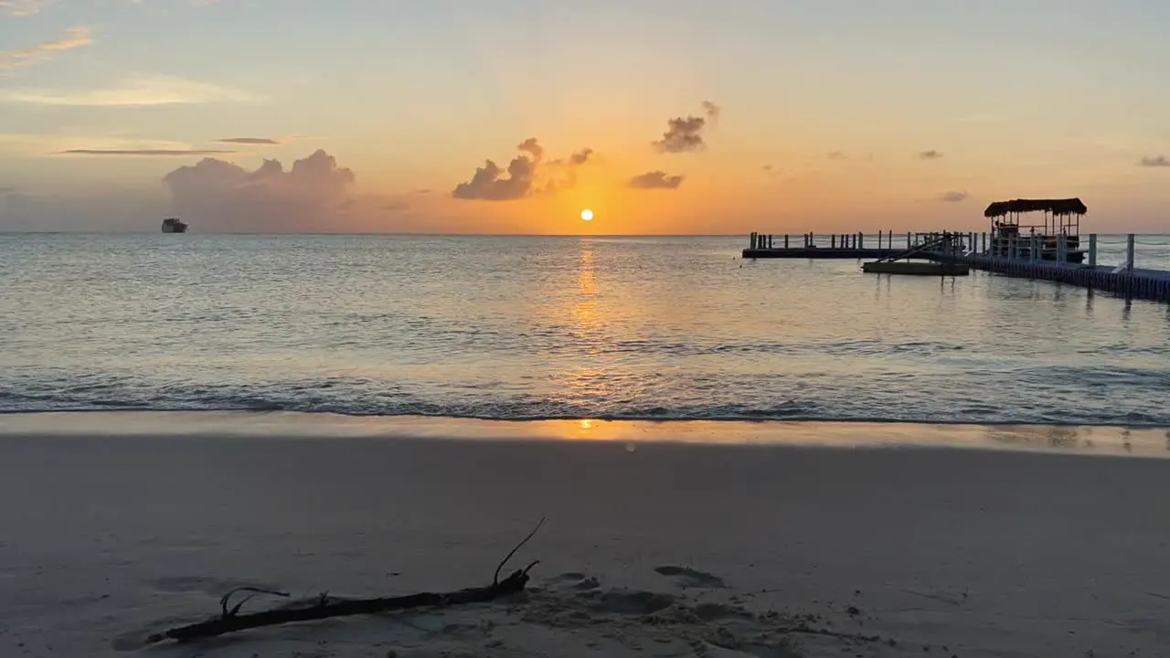 Timelapse of waves and sunset during a golden hour