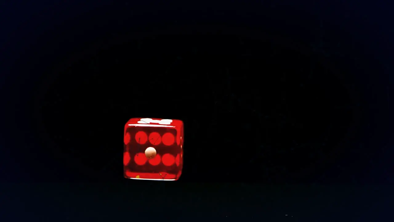 Animation of molecules over dice on dark back ground