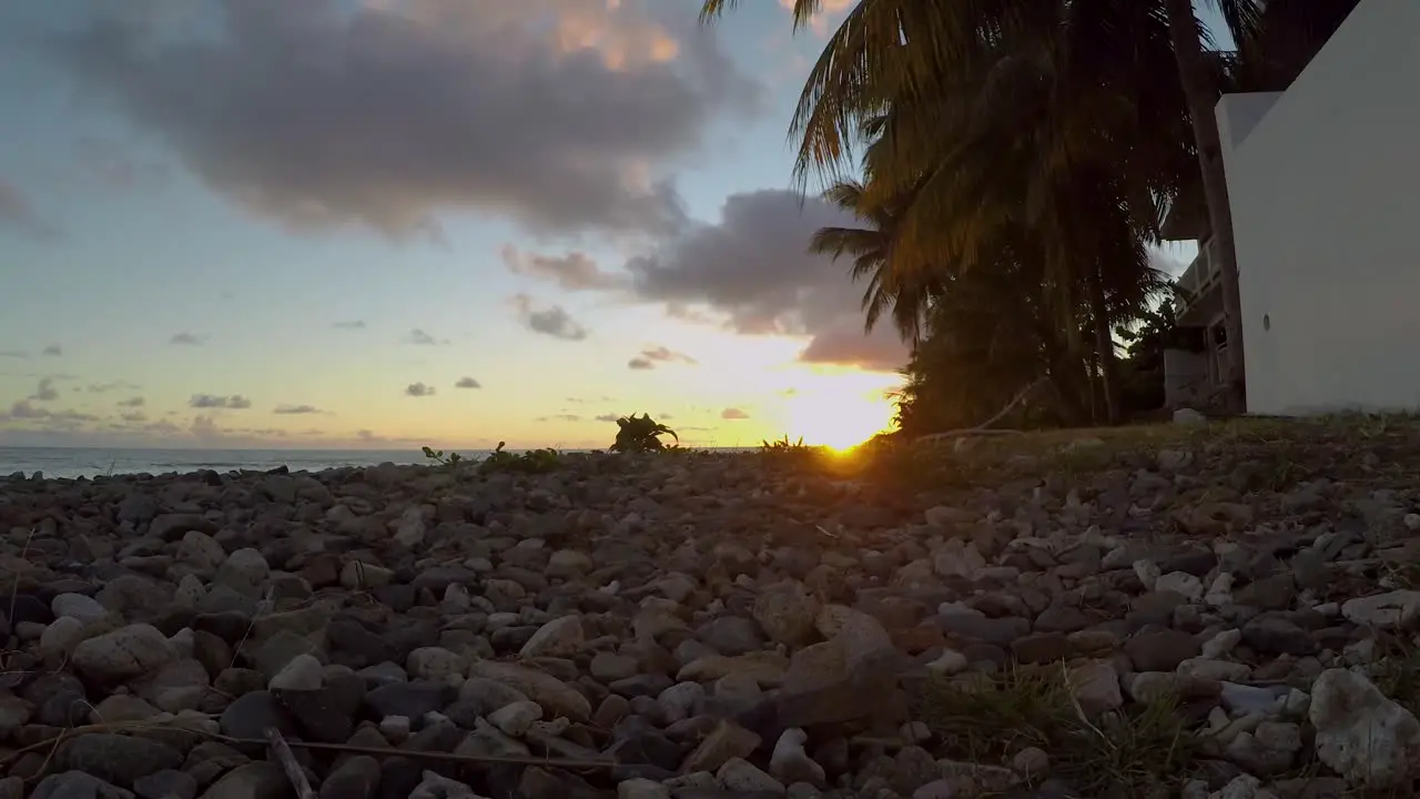 Time Lapse of the sunset and the moving clouds in the beach