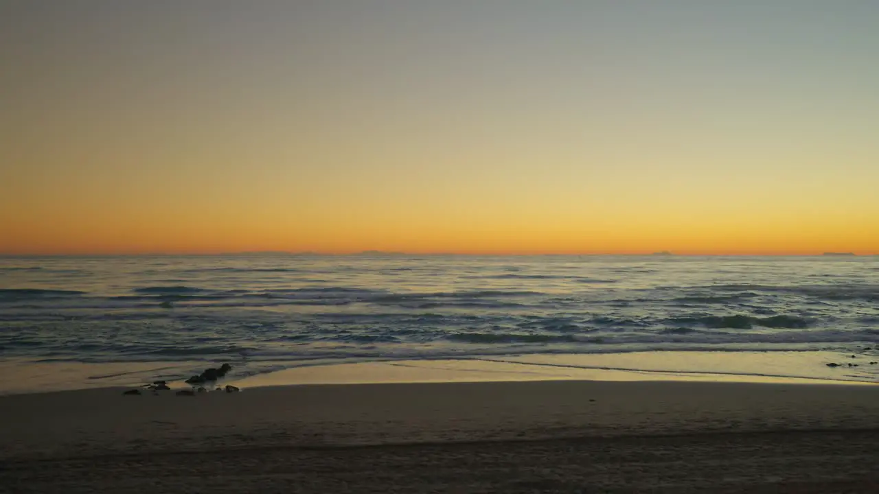 Empty beach during dusk hours