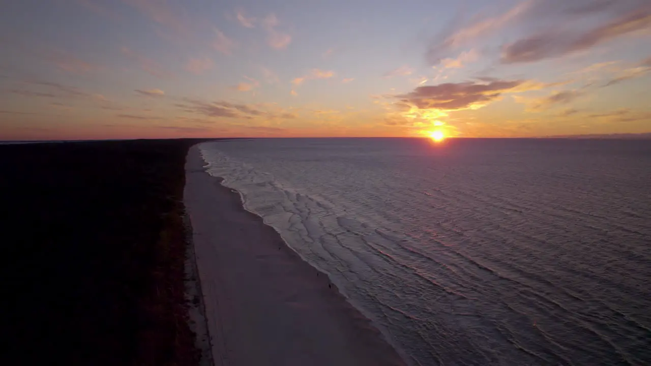 Aerial View Of Orange Sunset On Horizon Over Beach Of Krynica Morska Poland