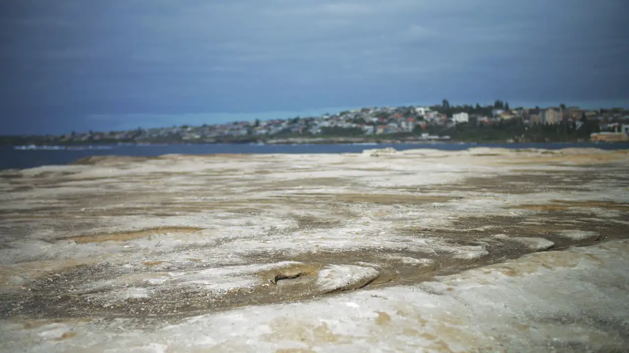 Waves splashing Clovelly beach coast Rocky shoreline Sydney NSW Australia