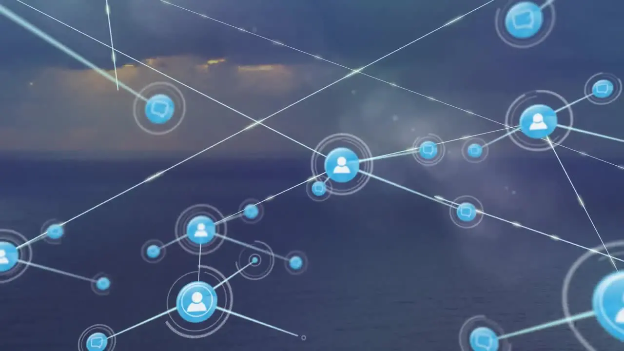 Animation of dots connected with lines over aerial view of sea against cloudy sky