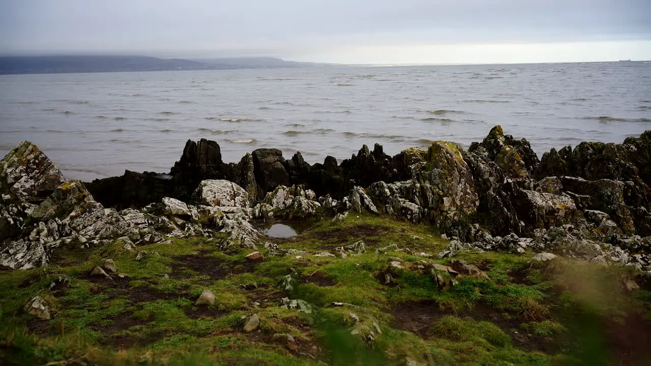 View of the Atlantic Ocean  rocks on the shore and waves on the ocean in Dundalk  Ireland