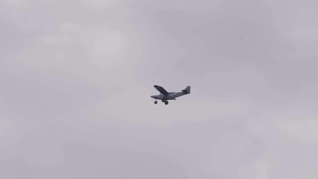 Cessna Plane Flying On Cloudy Sky Above Queensland Australia