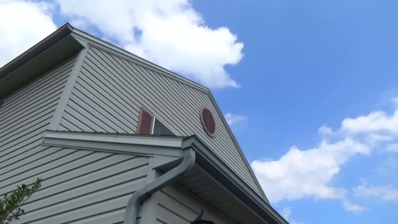 Time Lapse Clouds and House