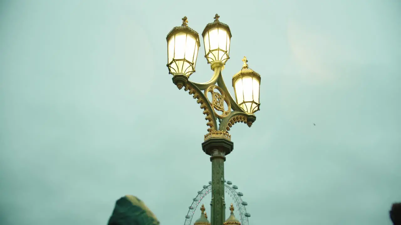 Street Lamp in London with London eye behind