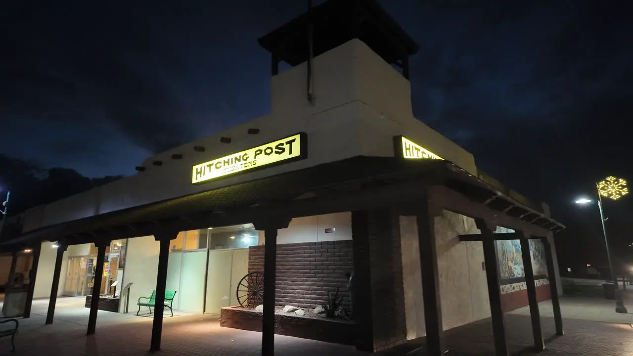 The Hitching Post movie theater entrance and ticket office at nighttime