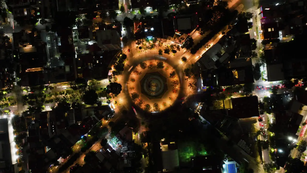 Drone motion time-lapse of traffic at the Cibeles Plaza night in Mexico City