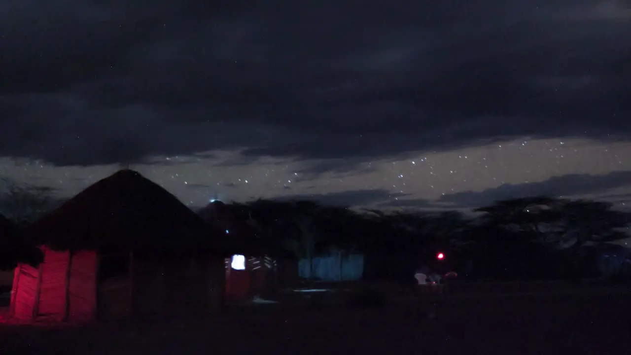 Kenya African night sky comes alive in stunning timelapse showcasing astronomy team in action against background of a National Park majestic Kilimanjaro mountain landscape magellanic clouds landscape