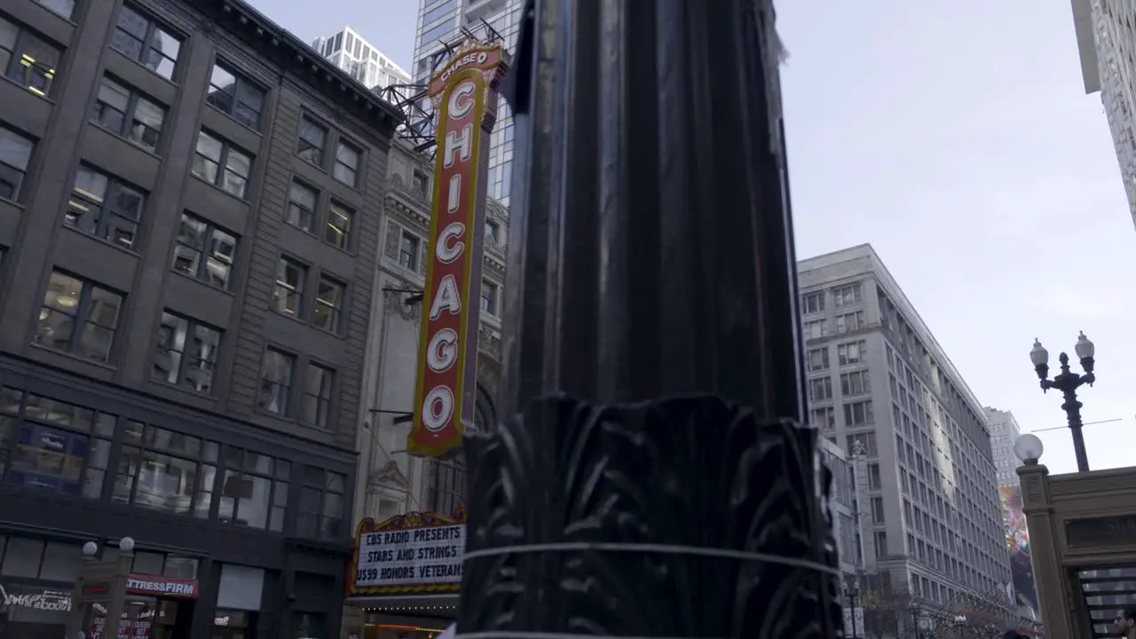 Panning shot of the iconic Chicago Theatre sign with surrounding architecture