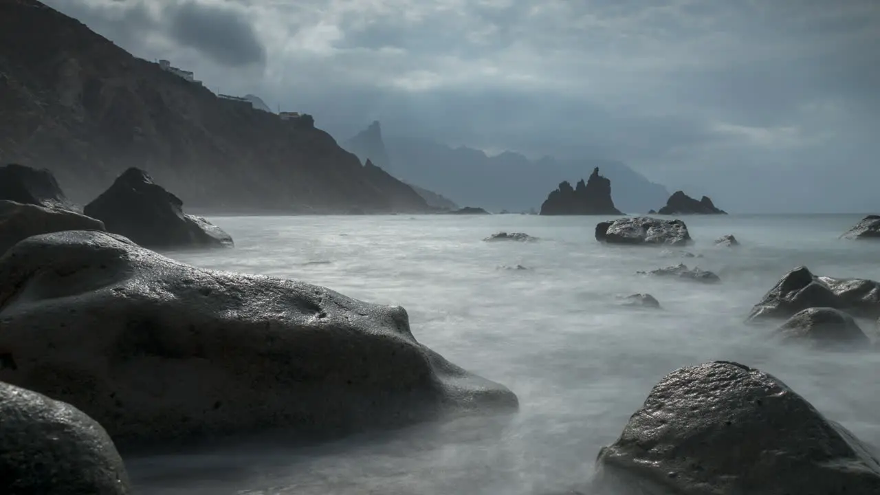 Time Lapse of Clouds Moving Above Coastline and Misty Atlantic Ocean Water