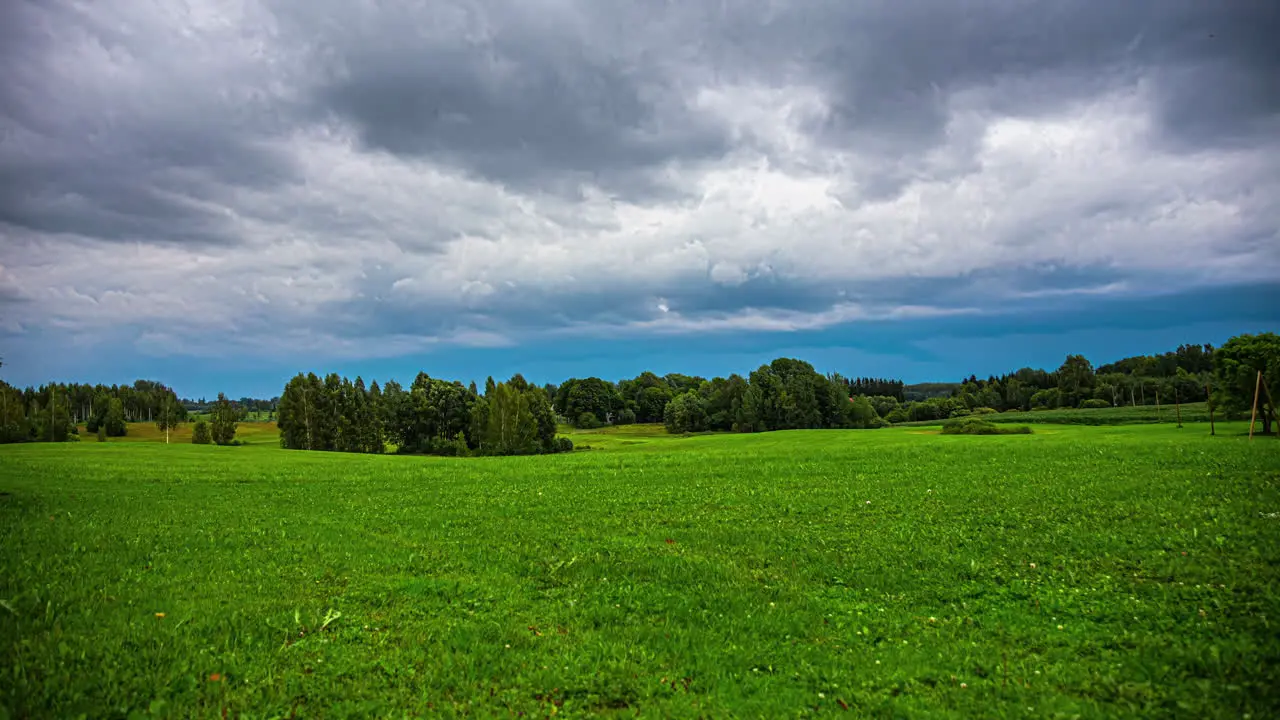 Dramatic Cloudscape of Stratonimbus Clouds in Timelapse Over the Picturesque Fields of Latvia