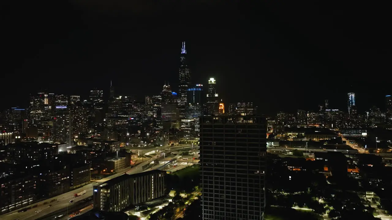 Drone shot revealing the illuminated Jane Byrne Interchange in Chicago USA