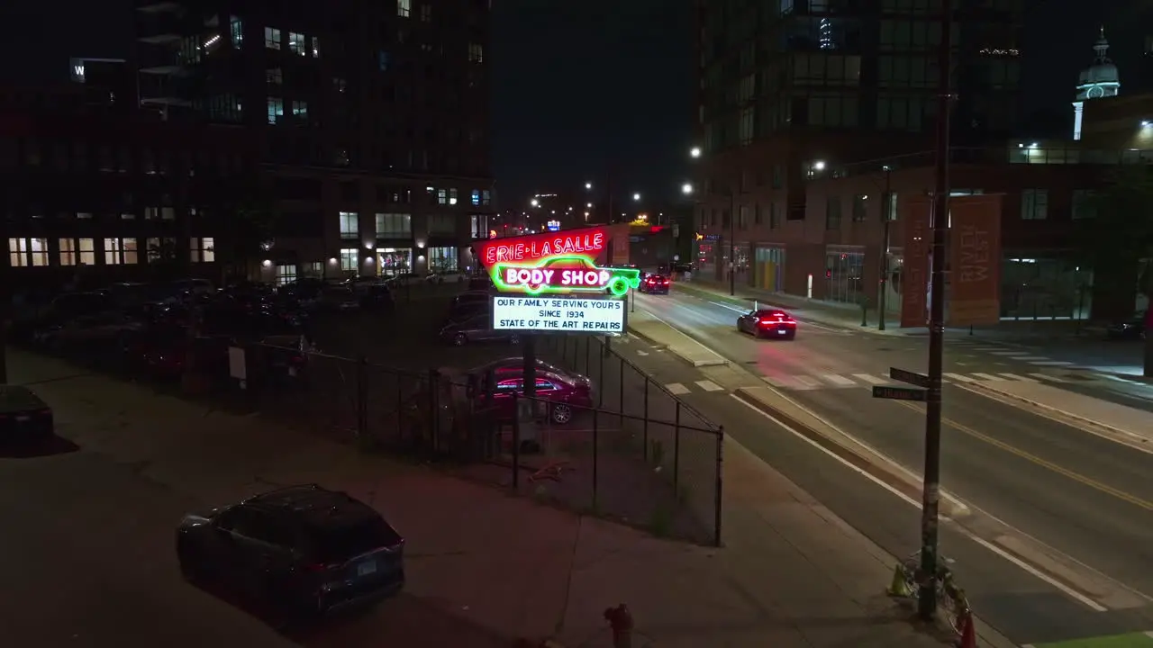 Aerial view toward the Erie Lasalle Body Shop sign night in River West Chicago USA