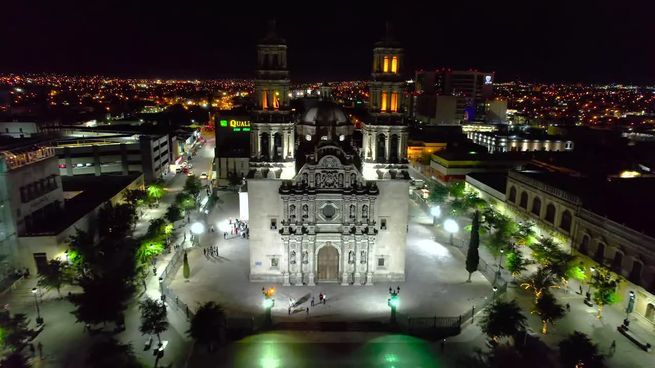 Illuminated Metropolitan Cathedral of Chihuahua during nighttime Aerial view