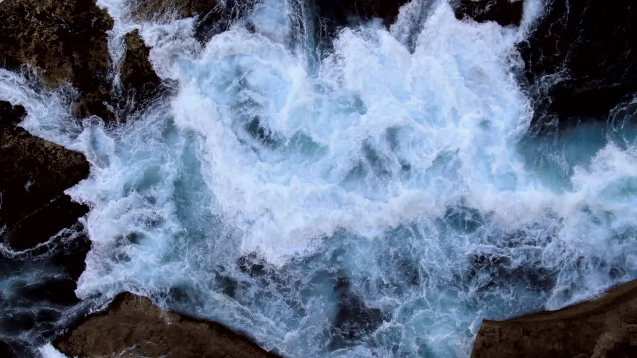 AERIAL Angry waves crashing on rocks at North Bondi in Sydney Australia