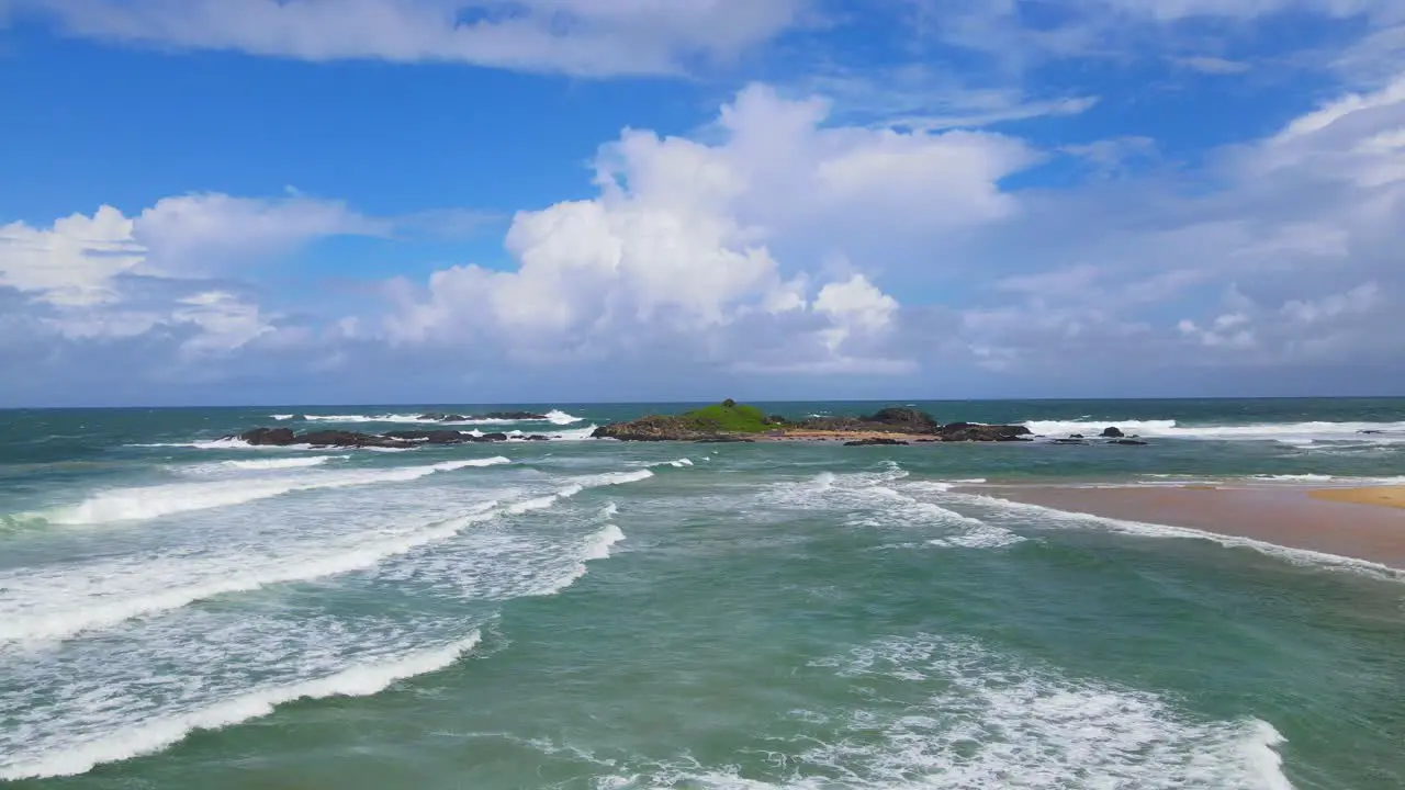 White Frothy Waves Washing The Shore Overlooking Rocky Headland At Sawtell Beach In New South Wales Australia