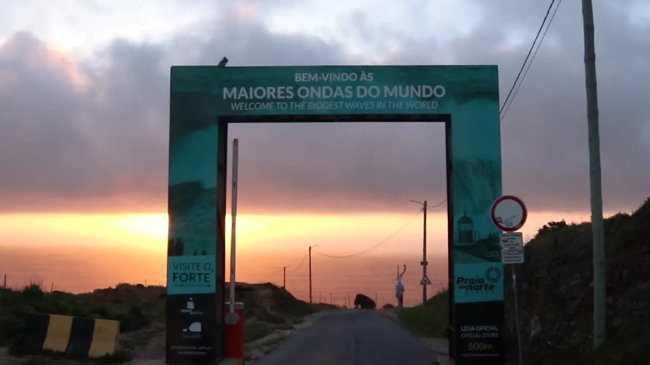 Welcome to the biggest waves in the world sign in Nazaré beach Portugal