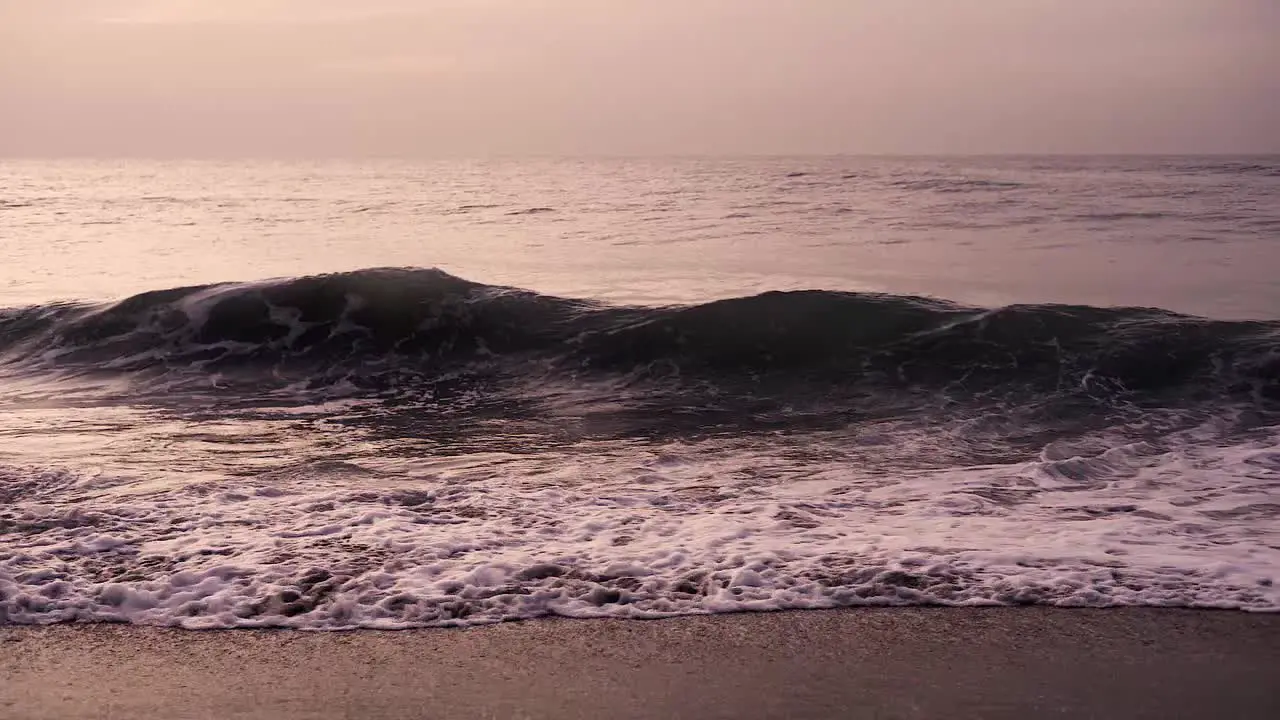 Slow-motion of sea waves crashing on a tropical beach