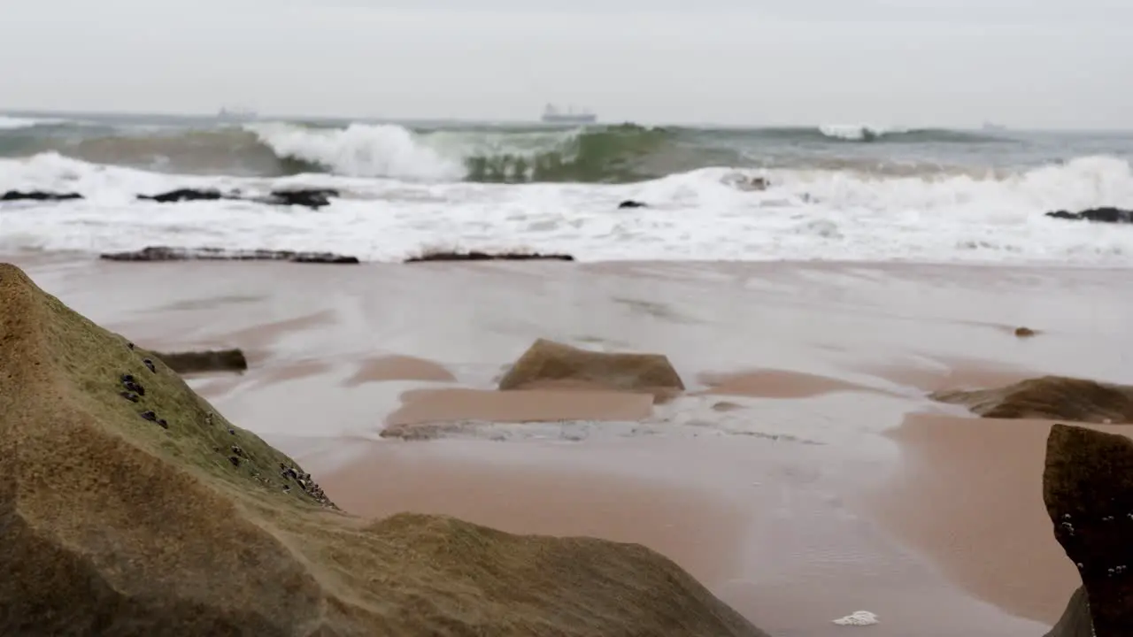 tracking shot of the rocky beach