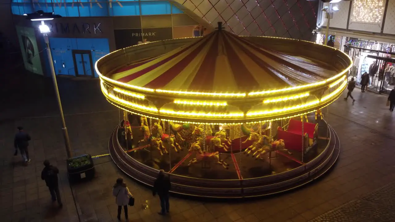 Static shot of moving children horse ride at Golden Gallopers