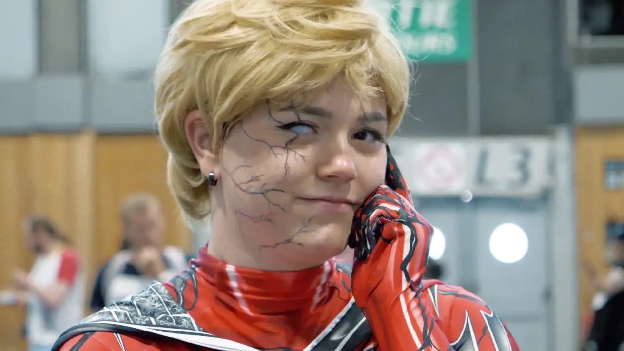 Close-up shot of a woman posing in a cosplay outfit at the Japanese Expo in Paris