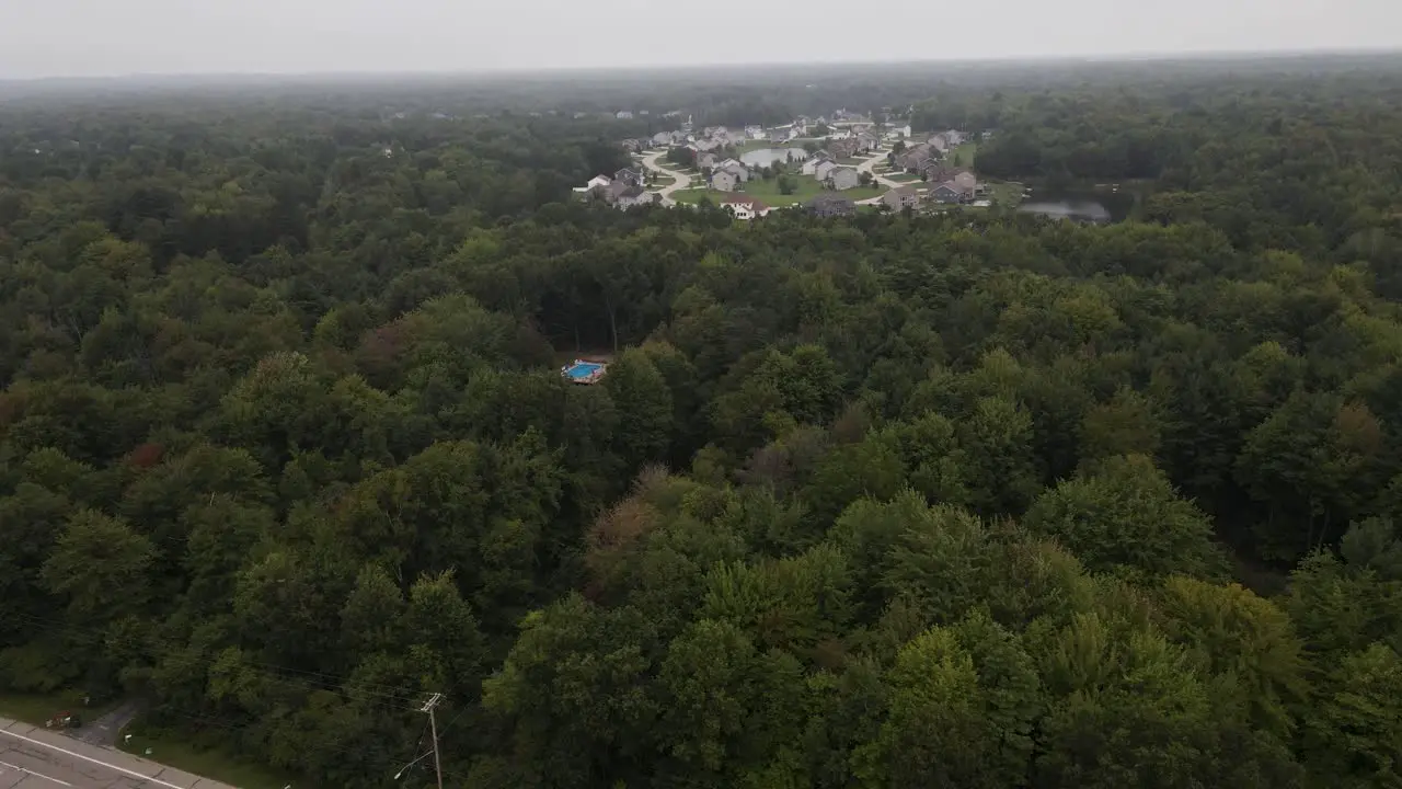 Suburban neighborhood on a misty and cloud day