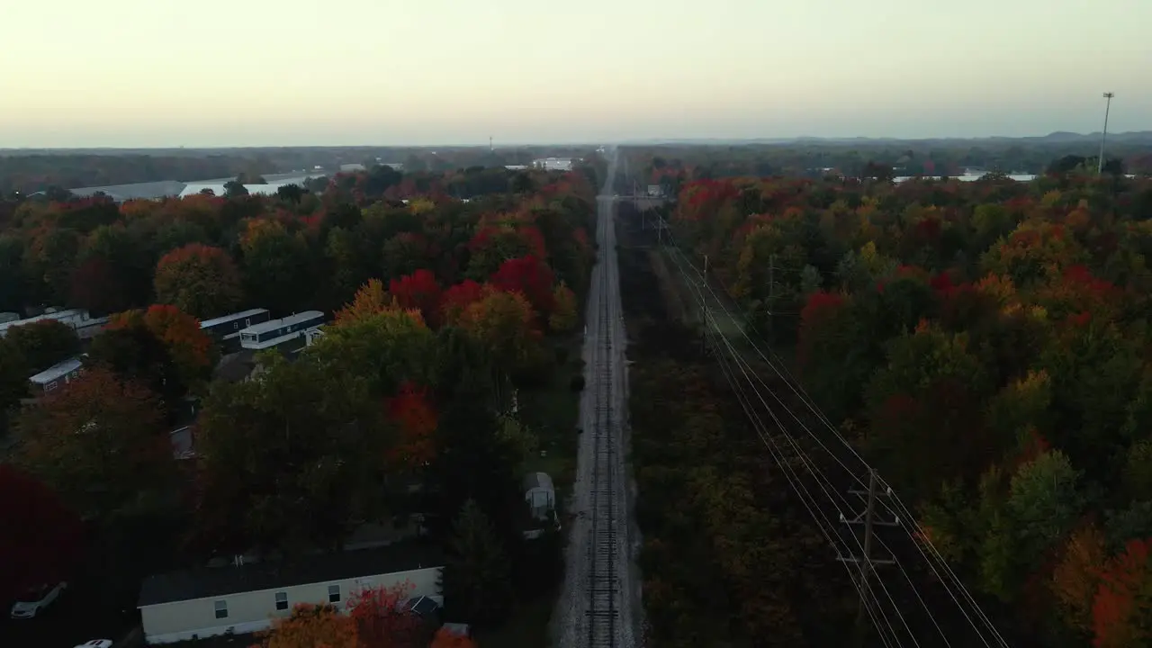 Reverse motion track over a railroad in fall