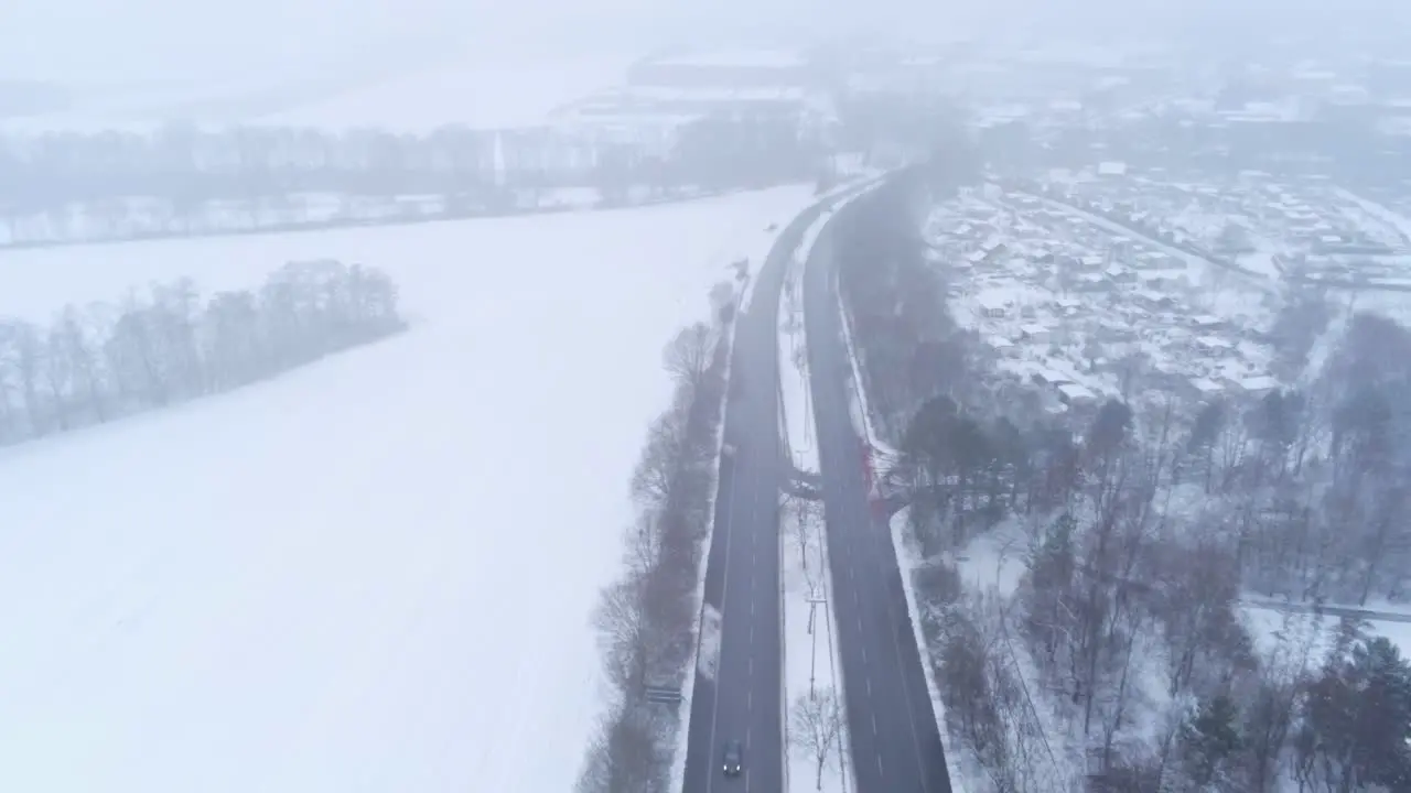 Aerial View of Cold Snowy Winter Landscape Dense Fog Above Highway Near Bochum Germany