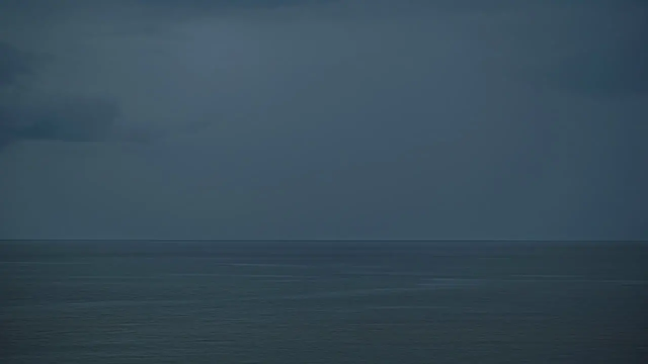 Gloomy Dark Sky Over Calm Deep Ocean